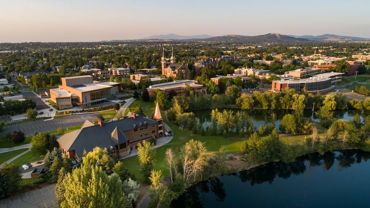 The Gonzaga University campus from the air, its spires above the trees